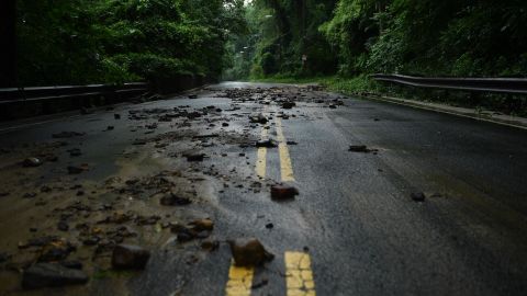 Flood debris from the rain storm is seen on Canal Road in Washington,DC.
