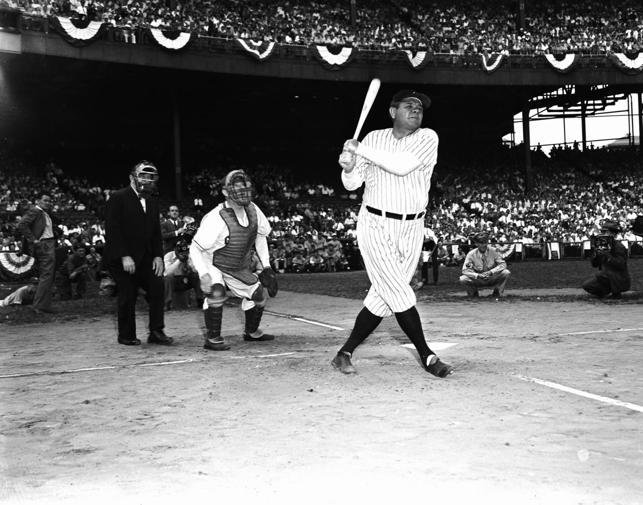 Legendary baseball player Babe Ruth takes a swing during the 1934 All-Star Game. The game was played at the Polo Grounds in New York.