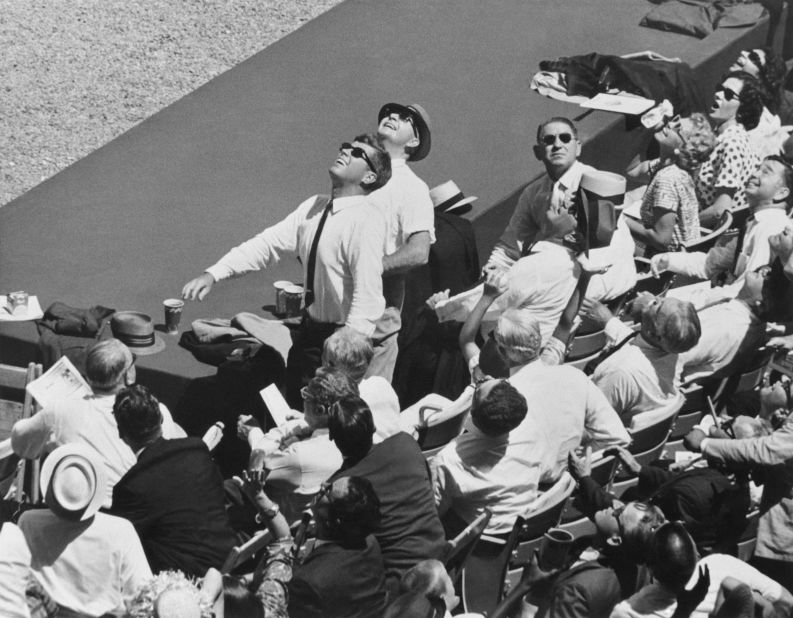 US President John F. Kennedy watches the flight of a ball during the All-Star Game in Washington in 1962.