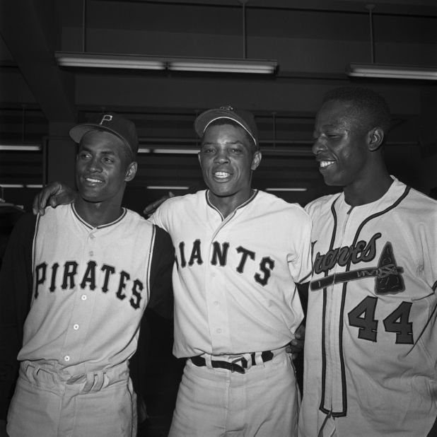Three National League stars — from left, Roberto Clemente, Willie Mays, and Hank Aaron — stand together for a victory portrait after the All-Star Game in 1961. Aaron appeared in more All-Star Games than any other player (25).