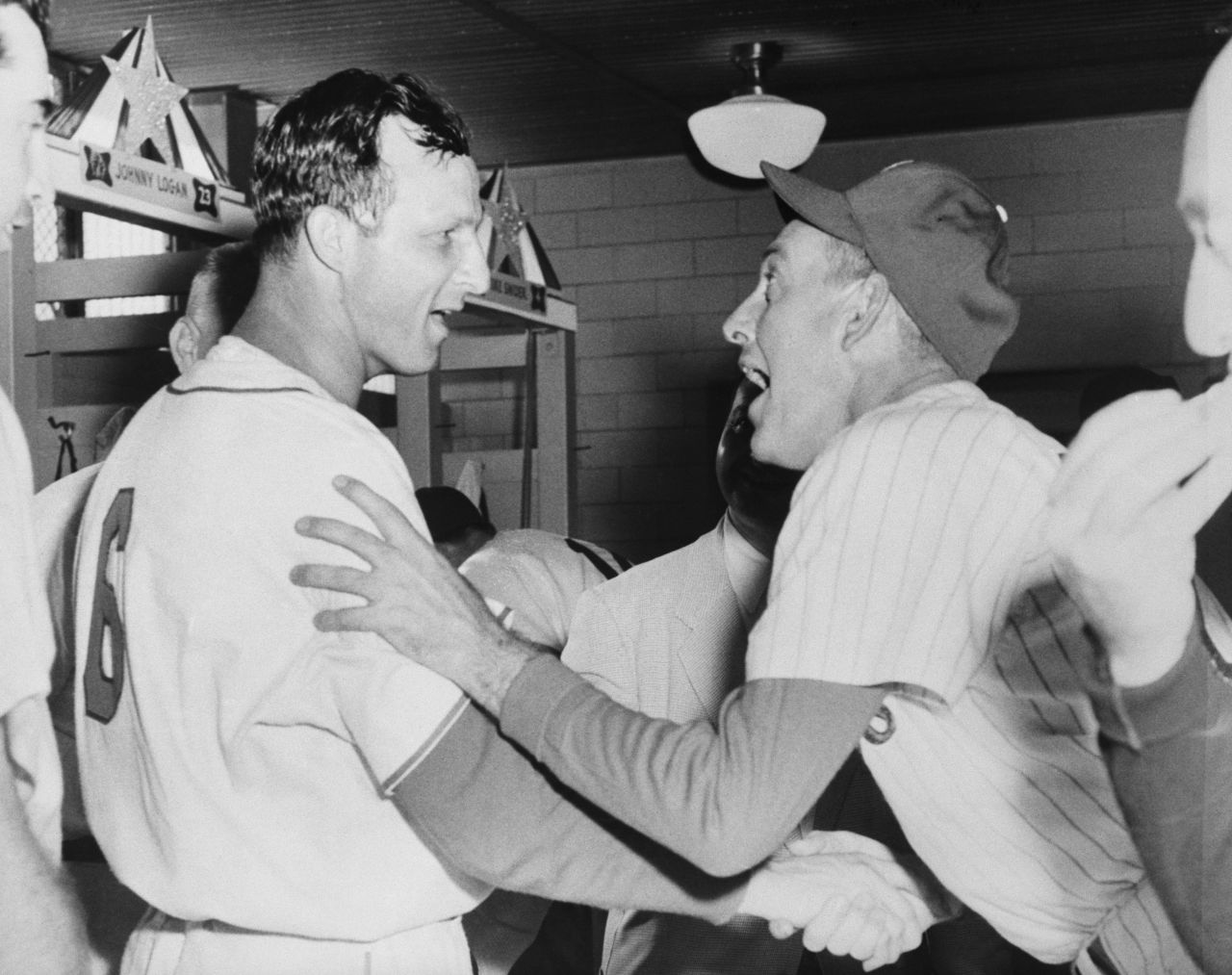 Stan Musial, left, is congratulated by National League manager Mayo Smith after hitting a walk-off home run to win the All-Star Game in 1955.