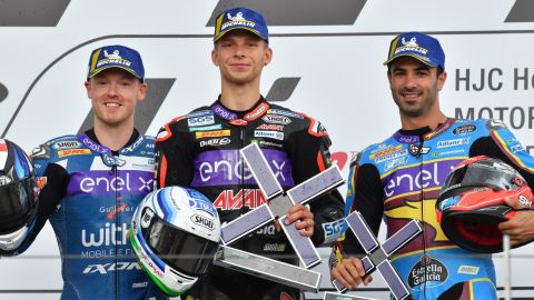 The podium of the first ever Moto E race: Bradley Smith (L, second place), Niki Tuuli (C, first place) and Mike Di Meglio (R, third place).