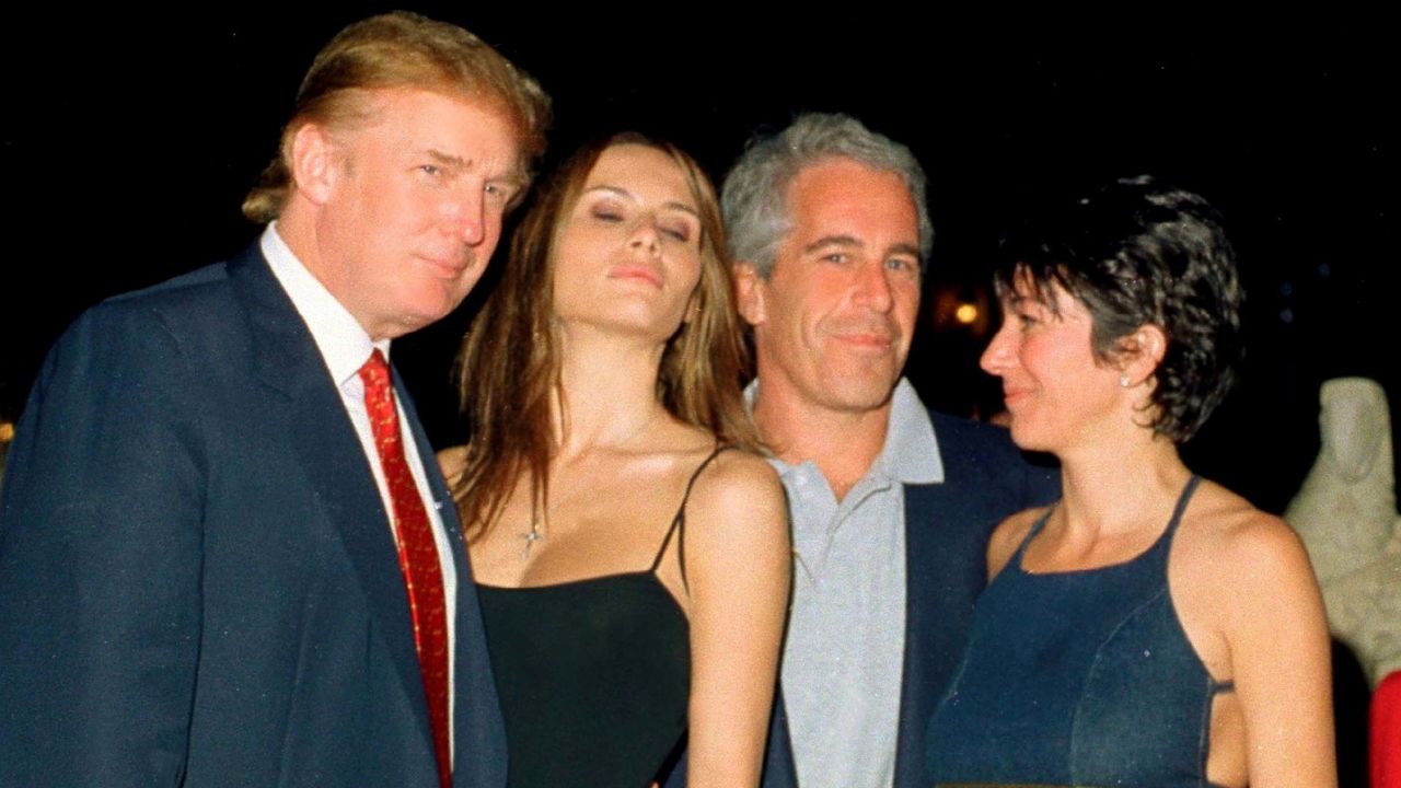 Jeffrey Epstein (second from right) posed with Donald Trump, Melania Trump and British socialite Ghislaine Maxwell at the Mar-a-Lago club in Palm Beach, Florida, February 12, 2000.