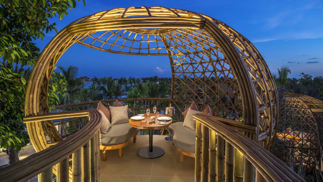 Bamboo pods are not your typical waterfront dinner seat.