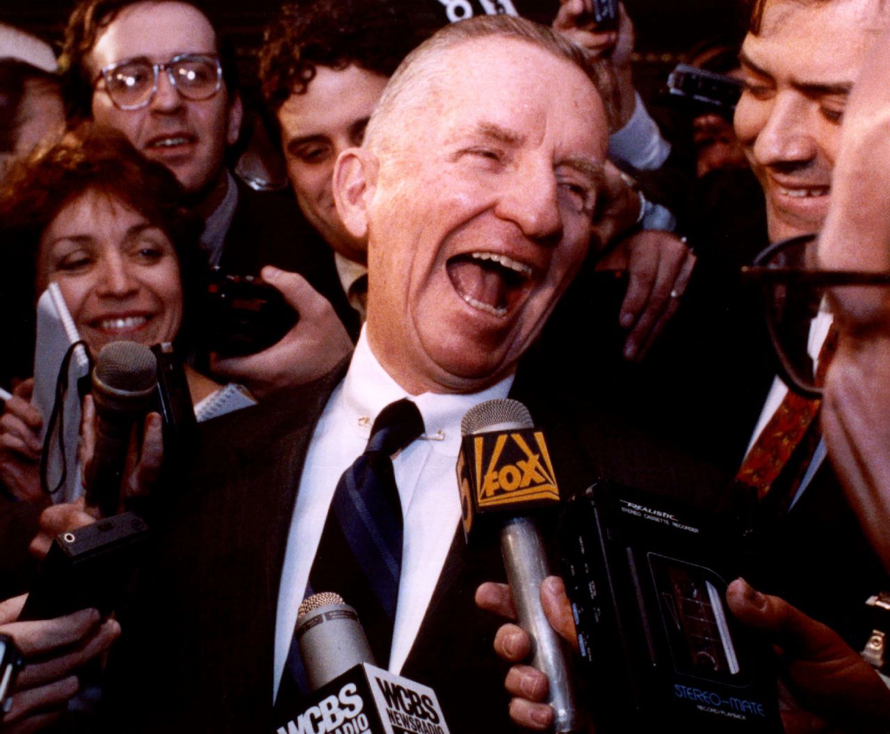 Perot laughs while talking to reporters in New York in May 1992. Perot was asked when he formally planned to enter the presidential race. He said "watch my lips" — a jab at President George H.W. Bush.