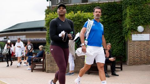 Patrick Mouratoglou (right) has called on tennis' governing bodies to find a "sustainable solution" for lower-ranked players. 