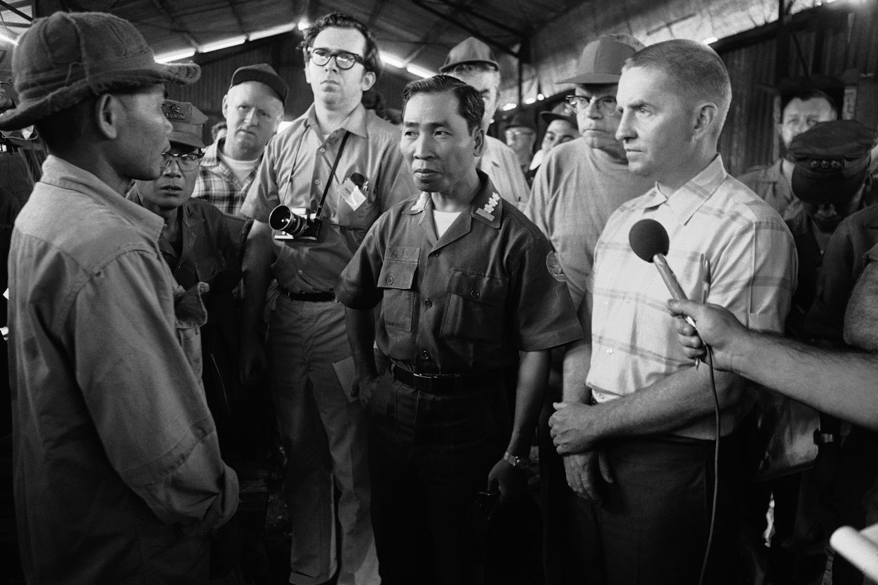 Perot, right, listens to a North Vietnamese prisoner in April 1970. Perot received national attention for his efforts during the Vietnam War to create better conditions for US prisoners of war. He traveled to Laos, where he met with ambassadors from Russia and North Vietnam. POWs later claimed that the publicity ultimately resulted in better treatment by the North Vietnamese.