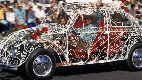 The Beetle's simple and instantly recognizable design has made it a frequent basis for automotive art. This Beetle, being driven in a parade in New York City in 1970, has a body made from decorative white wrought iron. 
