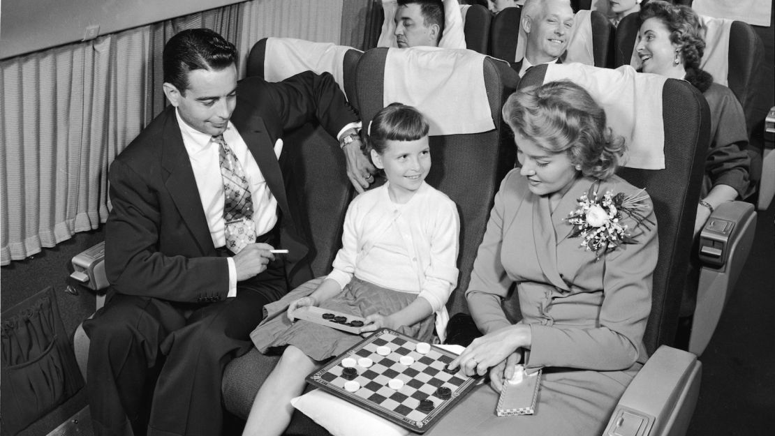 We've come a long way, baby. In the 1950s, inflight entertainment meant checkers and cigarettes.  