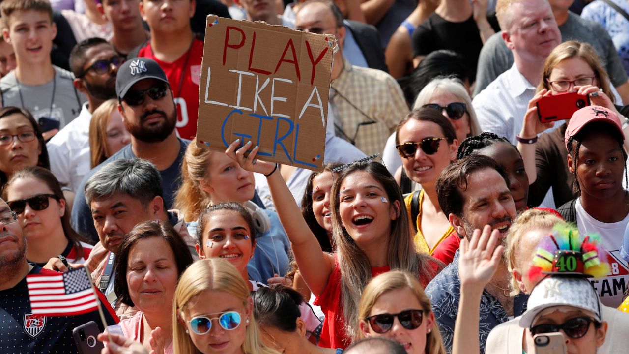 Thousands of fans gathered along the parade route to cheer on the women.