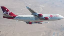 From Virgin Orbit: On November 18th, 2018, a new sight appeared in the baby-blue skies over Southern California: A specially modified 747-400 carrying a 70-foot-long rocket under its wing soared through the air as part of a successful test flight for Virgin Orbit's LauncherOne. Sir Richard Branson's small satellite launch company completed a flawless test flight, proving that its carbon-fiber two-stage rocket works perfectly as a pair with Cosmic Girl, the customized former passenger aircraft that serves as the company's "flying launch pad." The successful test puts more air under the wings—and fins—of the company's plans to reach orbit in early 2019.