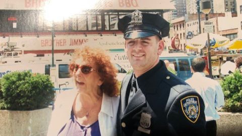 Mark Restivo with his grandmother at his graduation from the NYPD police academy in July 2008.