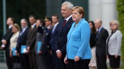 BERLIN, GERMANY - JULY 10: German Chancellor Angela Merkel (CDU, R) trembles, an affliction she has shown lately, as she attends a military welcome ceremony with Finnish Prime Minister Antti Rinne on July 10, 2019 in Berlin, Germany. Rinne, chairman of the Finnish Social Democrats, was elected to office the previous month.  (Photo by Adam Berry/Getty Images)