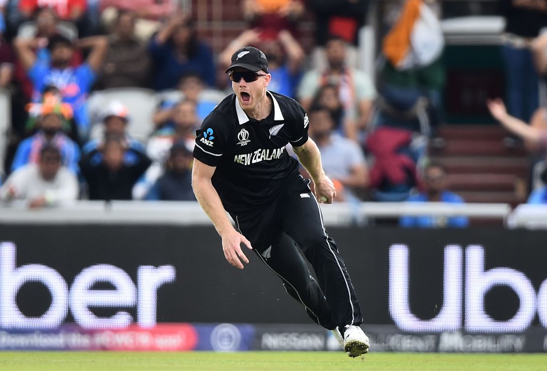 Jimmy Neesham catches Dinesh Kartik as New Zealand takes control at Old Trafford.
