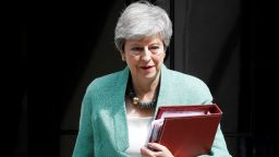 Britain's Prime Minister Theresa May leaves 10 Downing Street in London on July 10, 2019, ahead of the weekly Prime Minister's Questions (PMQs) question and answer session in the House of Commons. - British Prime Minister Theresa May's government on Monday reiterated its "full support" for its ambassador to Washington, Kim Darroch, after US President Donald Trump said he would no longer deal with him. (Photo by Tolga AKMEN / AFP)        (Photo credit should read TOLGA AKMEN/AFP/Getty Images)