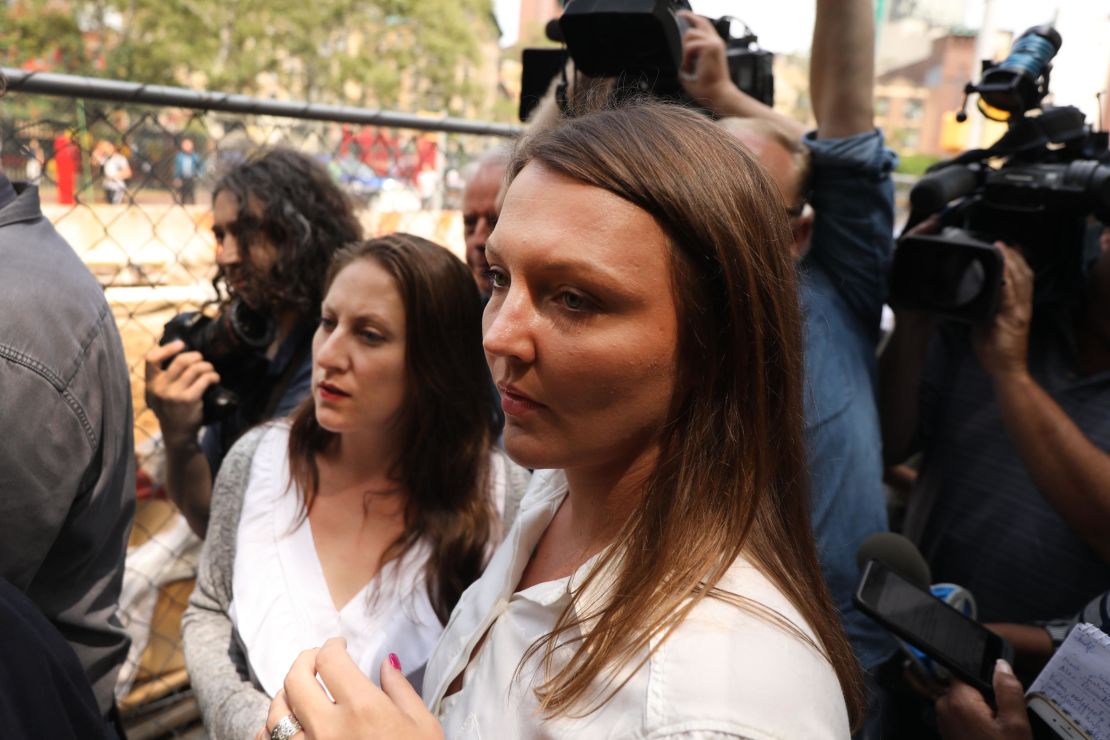 Courtney Wild, right, and another purported victim of Jeffrey Epstein  leave a Manhattan court house after a hearing on sex trafficking charges against Epstein on July 8, 2019 in New York City.