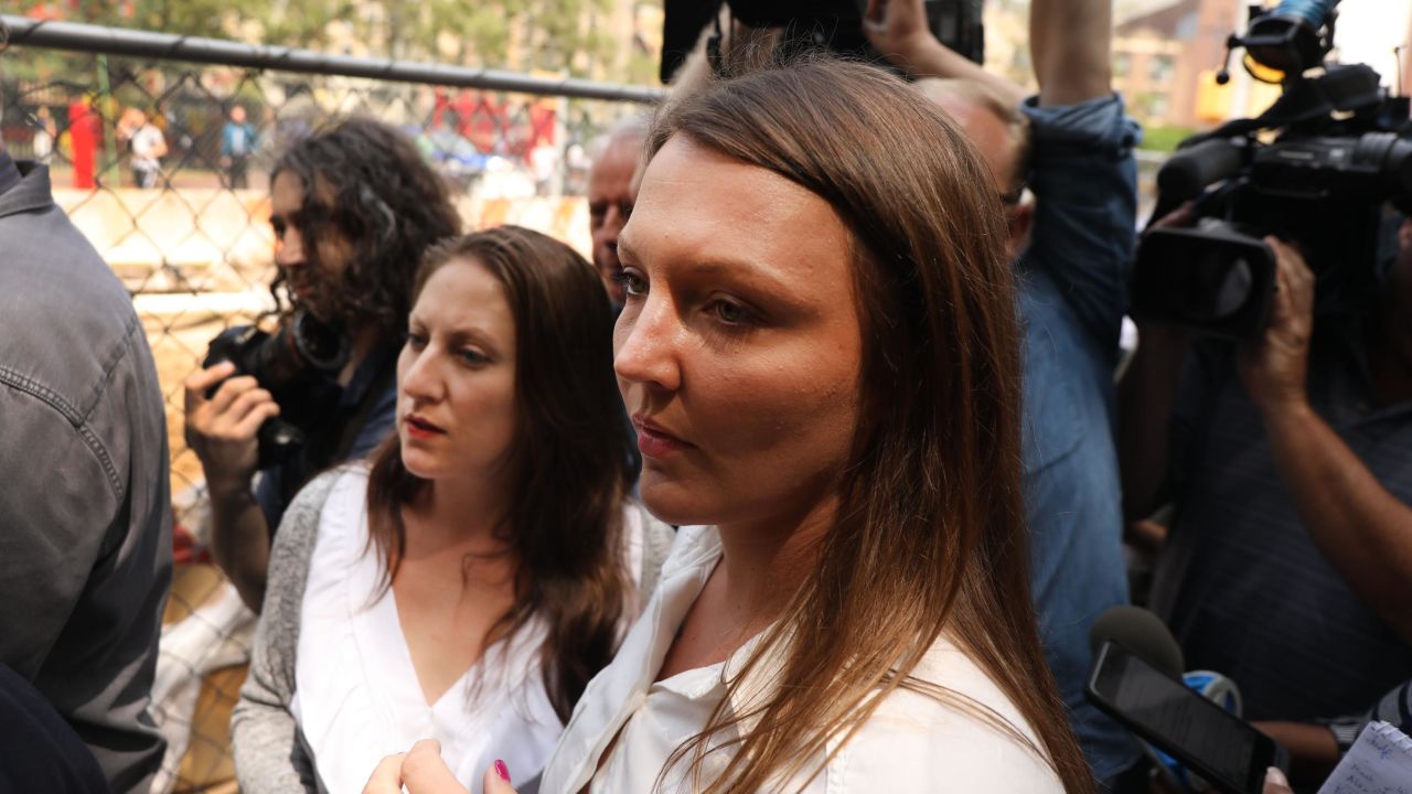 Courtney Wild, right, and another purported victim of Jeffrey Epstein  leave a Manhattan court house after a hearing on sex trafficking charges against Epstein on July 8, 2019 in New York City.