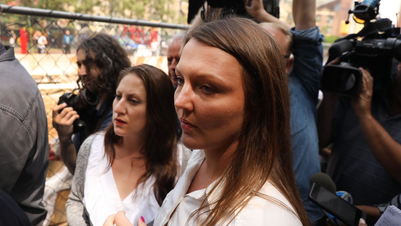 Courtney Wild, right, and another purported victim of Jeffrey Epstein leave a Manhattan court house after a hearing on sex trafficking charges against Epstein on July 8, 2019 in New York City.
