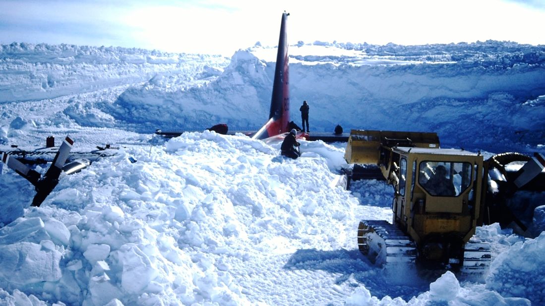 <strong>A week later:</strong> This wider view shows the slow, steady work accomplished in seven days. "Here, both wings are uncovered and we're working on top of the fuselage," says Mathews. 