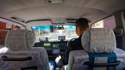 Kyoto, Japan - March 28, 2015 : A dedicated taxi driver is doing his job.