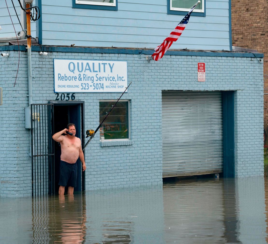 David Fox makes a call on Wednesday, July 10, from his business on Poydras Street in New Orleans.