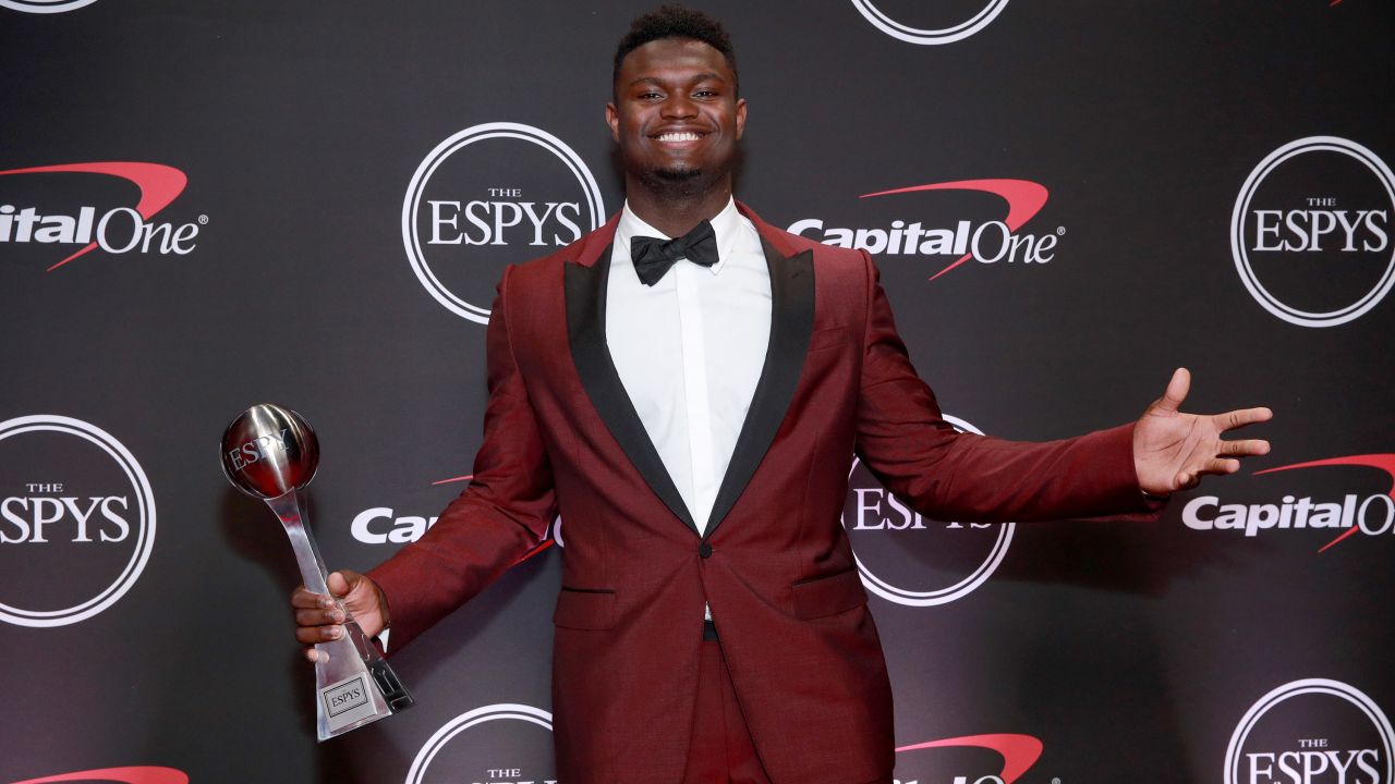 Zion Williamson poses with his ESPY for Best College Athlete.