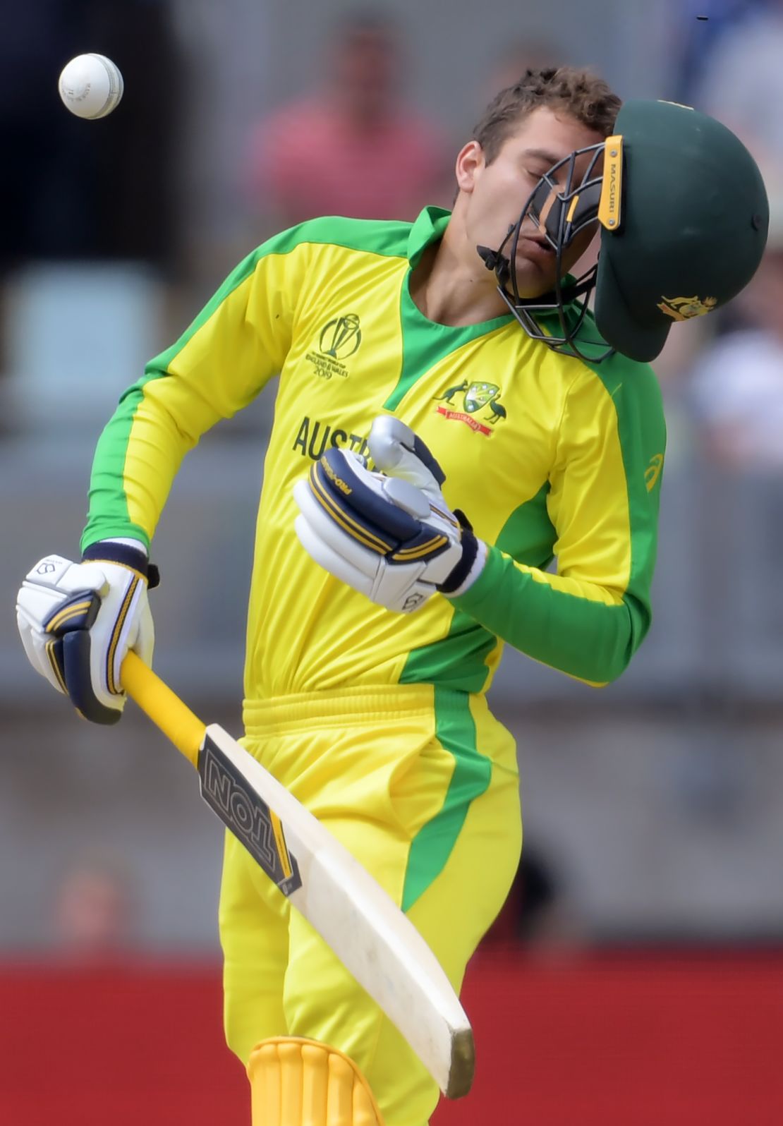 Australia's Alex Carey reacts after being hit by a bouncer from England's Jofra Archer.