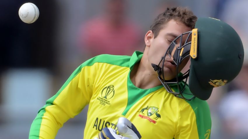 Australia's Alex Carey reacts after being hit by a bouncer from England's Jofra Archer during the 2019 Cricket World Cup second semi-final between England and Australia at Edgbaston in Birmingham, central England,  on July 11, 2019. (Photo by Dibyangshu Sarkar / AFP) / RESTRICTED TO EDITORIAL USE        (Photo credit should read DIBYANGSHU SARKAR/AFP/Getty Images)