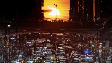 Manhattanhenge sun set. Manhattanhenge is where the rising or setting sun aligns with the street grid in Manhattan, New York City. Here it is as seen from 42nd Street in Manhattan in New York City on July 12, 2018 (Photo by Michael Brochstein/Sipa USA)(Sipa via AP Images)