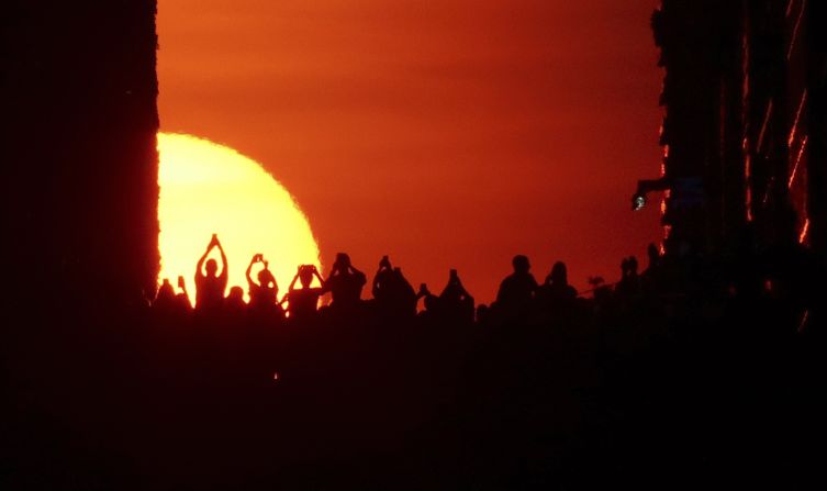 <strong>Bridge view:</strong> People stand on the Pershing Square Bridge on Park Avenue during Manhattanhenge on July 13, 2018.