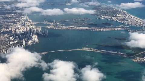 A view of downtown Miami and South Beach from a plane shows the oceanfront development of the past.