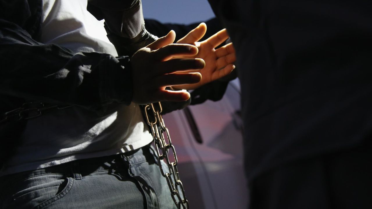 A man is detained by Immigration and Customs Enforcement agents on October 14, 2015, in Los Angeles, California. 