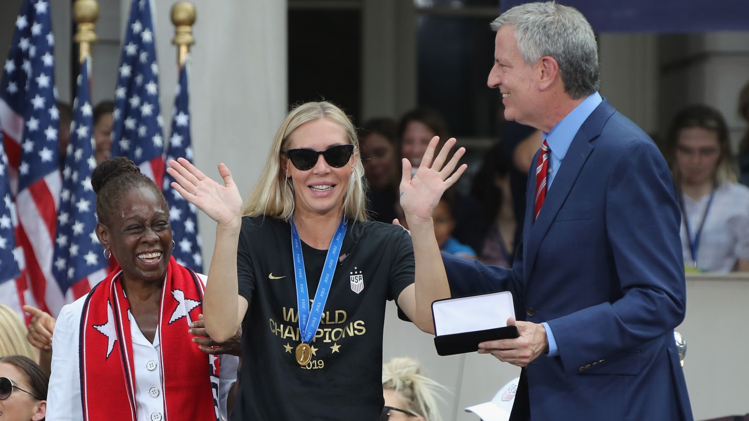 Allie Long of the United States Women's National Soccer Team receives the key to the city from Chirlane McCray and Mayor Bill de Blasio on July 10, 2019 in New York City. 