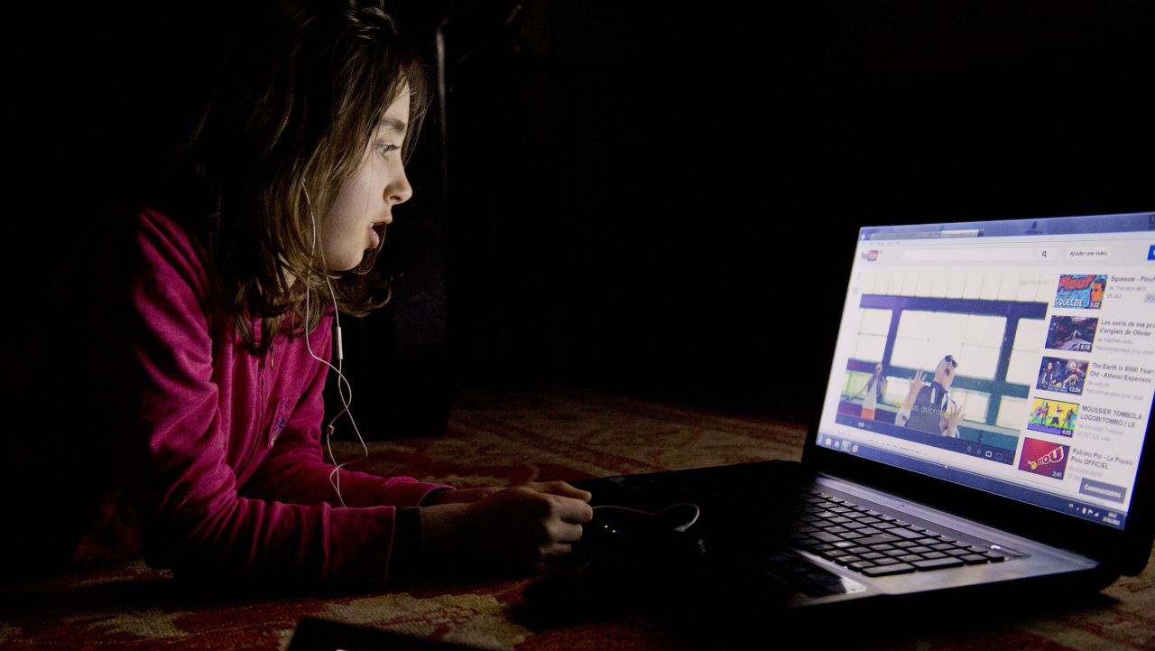 A girl watches a video on youtube on a computer on February 27, 2013 in Chisseaux near Tours, central France.  AFP PHOTO/ ALAIN JOCARD        (Photo credit should read ALAIN JOCARD/AFP/Getty Images)