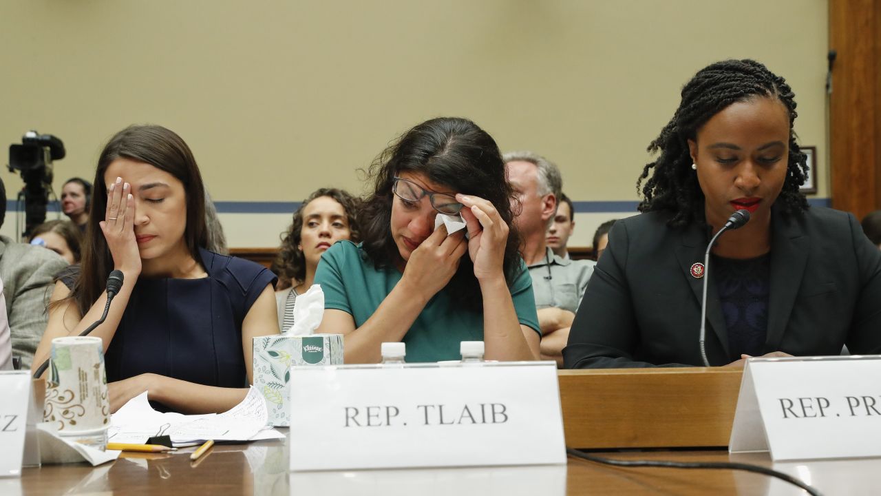 Rep. Rashida Tlaib, D-Mich., center, wipes her eyes after testifying before the House Oversight Committee hearing on family separation and detention centers, Friday, July 12, 2019 on Capitol Hill in Washington. Sitting at the panel with Tlaib are Rep. Alexandria Ocasio-Cortez, D-NY., left, and Rep. Ayanna Pressley, D-Mass., right. (AP Photo/Pablo Martinez Monsivais)