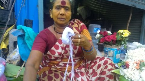 Rukmani P., 54, says she can't afford to continue to run a pump that extracts water from a well. 
