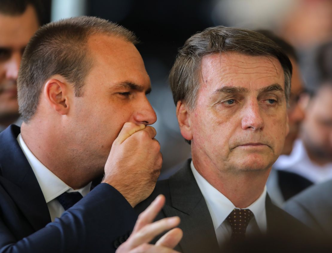 Jair Bolsonaro, right, with his son Eduardo Bolsonaro, left, on November 14 in Brasilia.