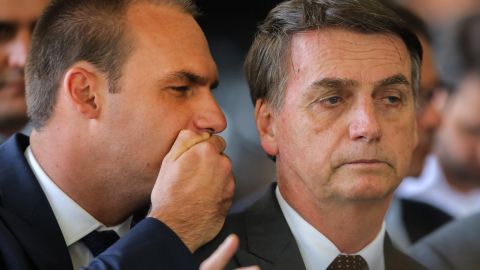 Jair Bolsonaro, right, with his son Eduardo Bolsonaro, left, on November 14 in Brasilia.