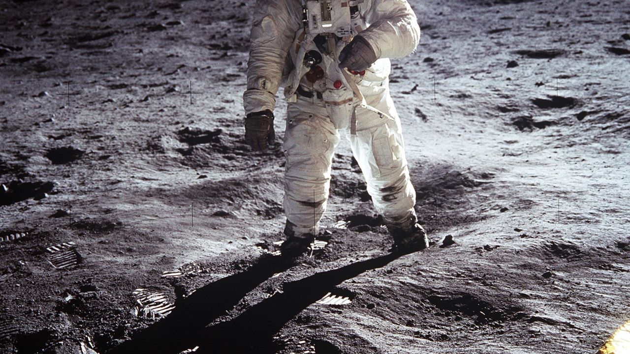 Astronaut Buzz Aldrin walking on the moon in 1969 during the first lunar landing of NASA's Apollo 11 space mission. 