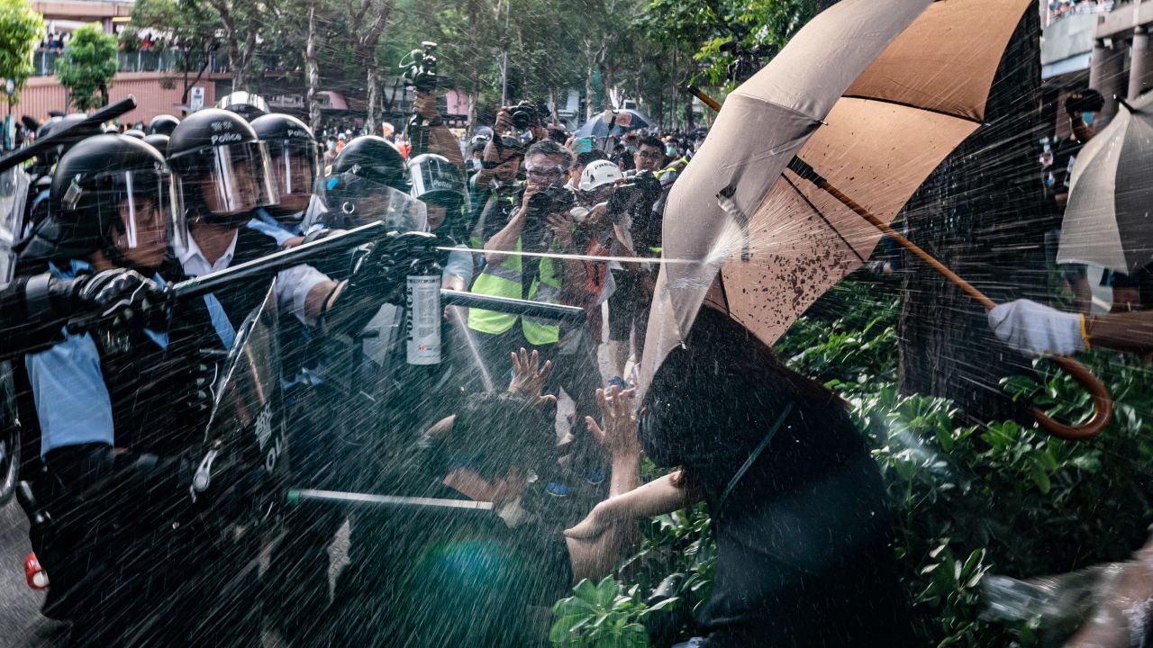 Demonstrators were marching in Sheung Shui when police pepper sprayed them.