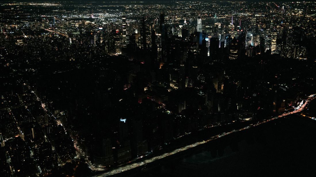 Seen from the air, a large section of Manhattan's Upper West Side and Midtown neighborhoods stand coated in darkness on Saturday, July 13.