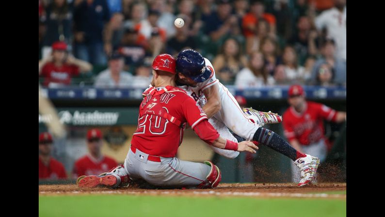 Houston Astros centerfielder Jake Marisnick collides with Los Angeles Angels catcher Jonathan Lucroy on Sunday, July 7.