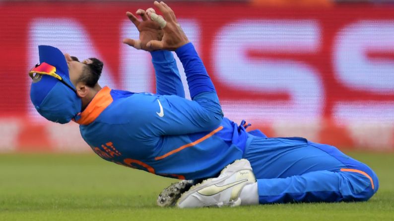 India's captain Virat Kohli reacts after a missed run out attempt during the 2019 Cricket World Cup semifinal between India and New Zealand in Manchester, England, on Tuesday, July 9.
