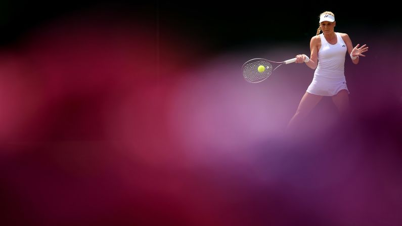 Dayana Yastremska of Ukraine plays a forehand against Shuai Zhang of China during the seventh day of play at Wimbledon on Monday, July 8.