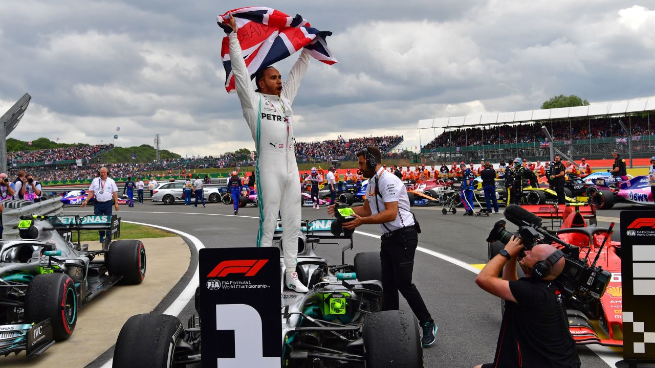 Lewis Hamilton celebrates a record sixth British Grand Prix.