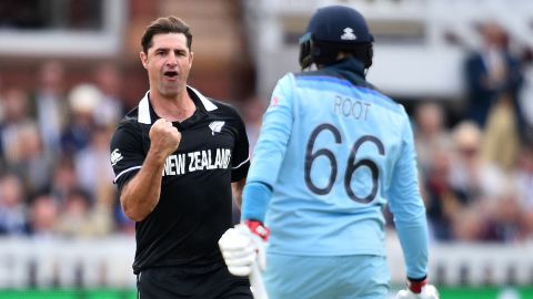 New Zealand's Colin de Grandhomme celebrates taking the wicket of England's Joe Root.