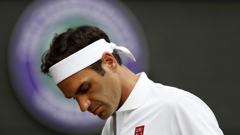 Roger Federer looks on during his match against Novak Djokovic in the men's singles final of the Wimbledon Tennis Championships in London on July 14.