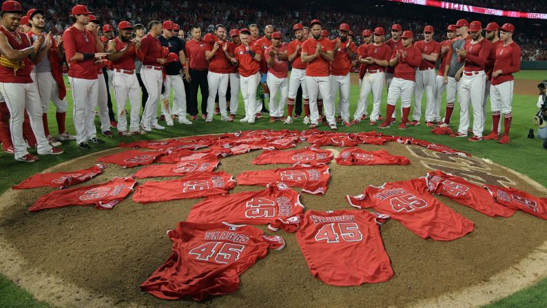 Los Angeles Angels players cover the mound with Tyler Skaggs No. 45 jerseys after the Angels defeated the Seattle Mariners in a no-hitter on July 12 at Angel Stadium in Anaheim, California. Skaggs died July 1.