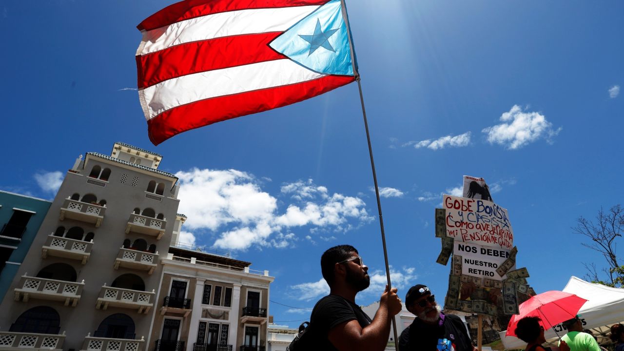 Protesters have been calling for the governor's resignation over the content of the leaked chats.