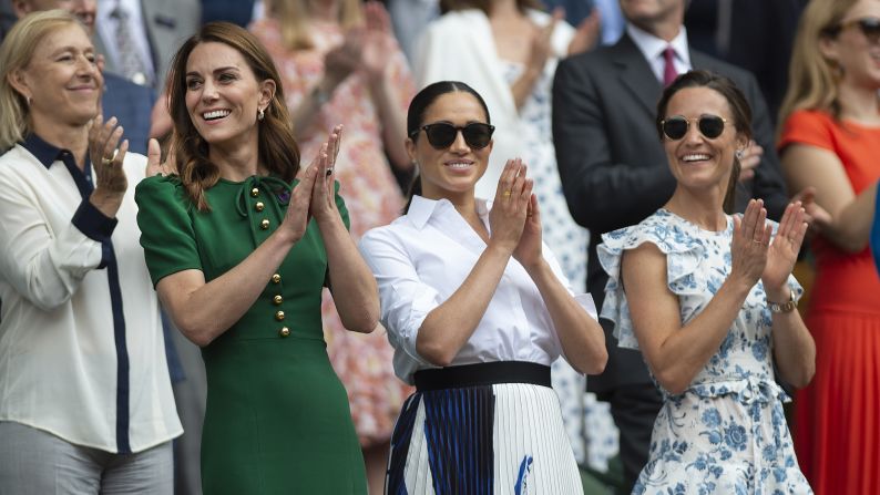 Catherine, Duchess of Cambridge; Meghan, Duchess of Sussex; and Pippa Middleton applaud the presentation after the final of the ladies' singles during the Wimbledon Tennis Championships on July 13, in London.